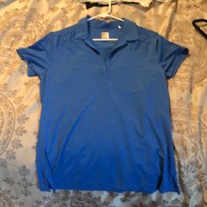Blue collared Callaway V neck golf shirt.